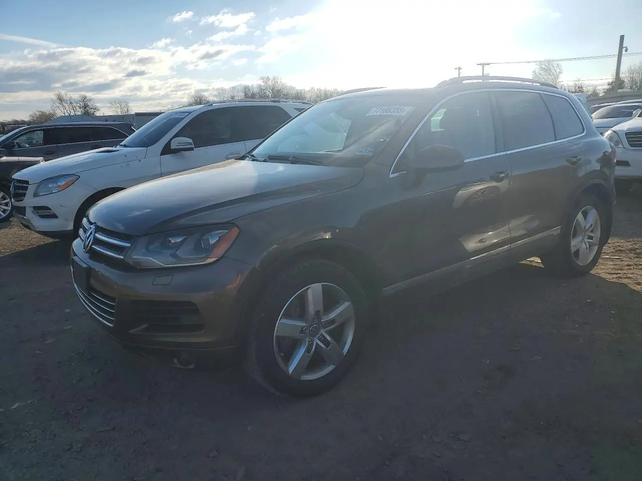 VOLKSWAGEN TOUAREG 2012. Lot# 77186355. VIN WVGFF9BP7CD001968. Photo 1