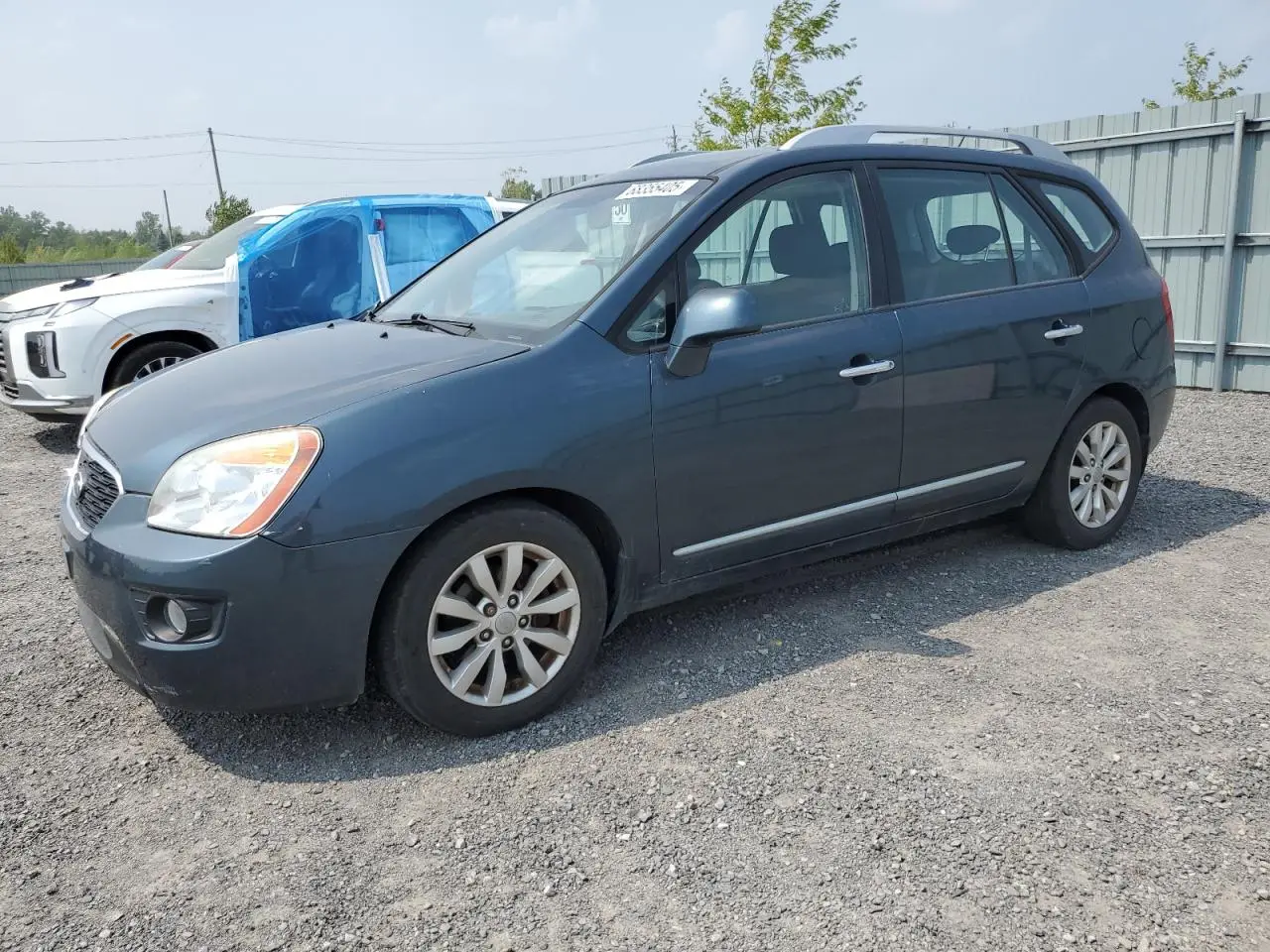 KIA RONDO 2012. Lot# 68355405. VIN KNAHH8A69C7408907. Photo 1